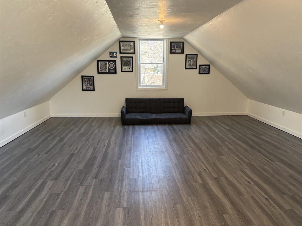227 Union Street Northbridge, MA 01588 - Photo 18 of 21 a view of an empty room window and wooden floor