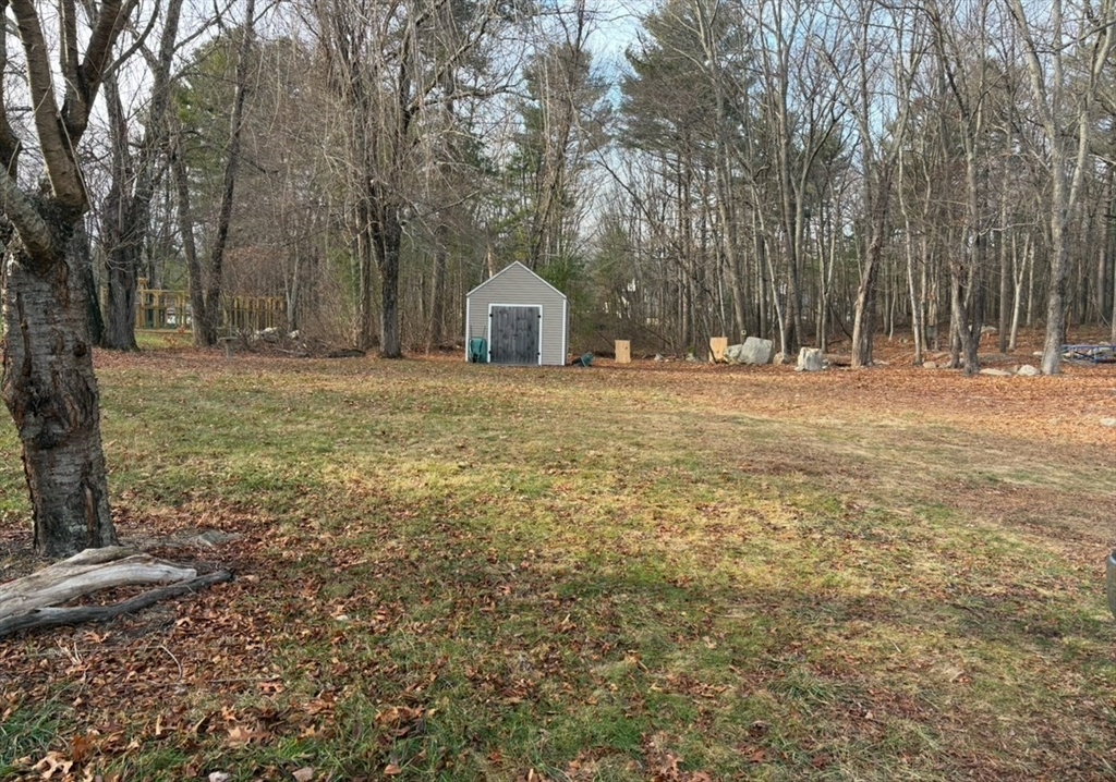 227 Union Street Northbridge, MA 01588 - Photo 5 of 21 a big yard with lots of green space and trees