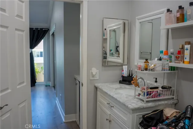 a room with furniture and wooden floor