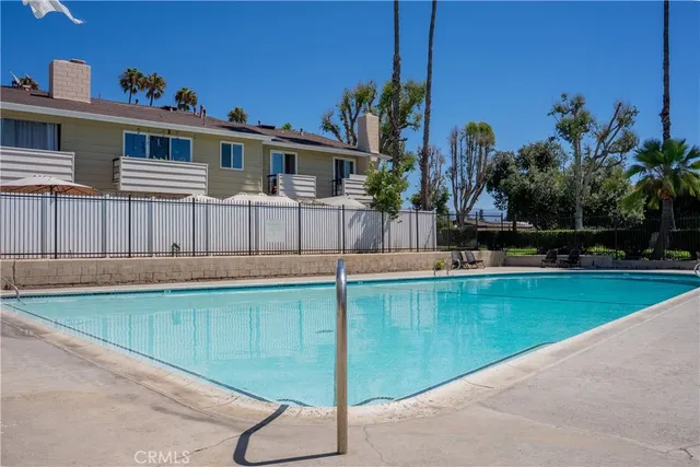 a view of a house with a swimming pool