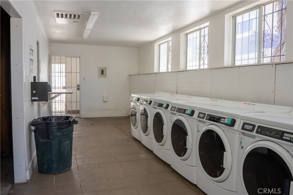 1192 Mitchell Avenue, Unit 3 Tustin, CA 92780 - Photo 28 of 30 a utility room with dryer and washer