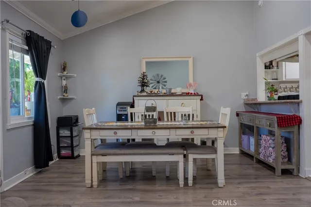 a dining room with furniture and a fireplace