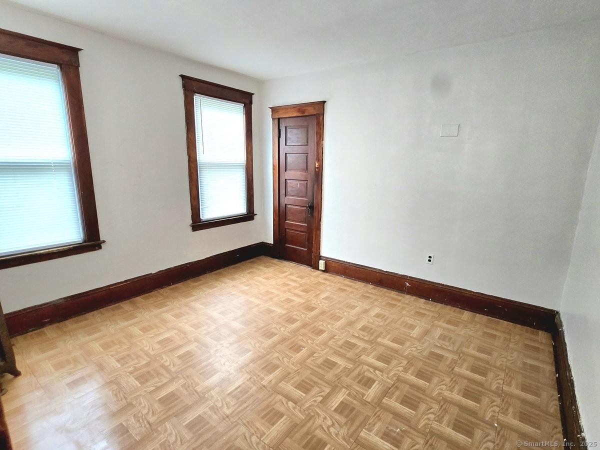 181 Bond Street, Unit 1 Hartford, CT 06114 - Photo 7 of 12 a view of empty room with window