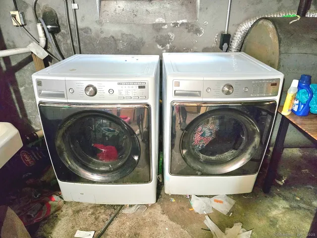 a utility room with dryer and washer