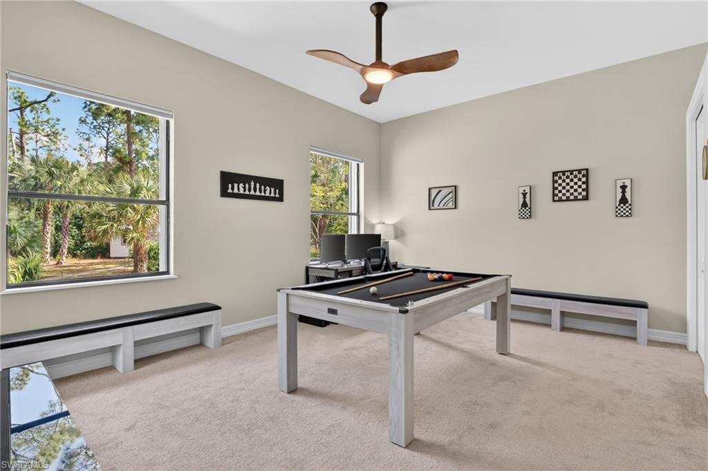 2360 19th Street Southwest Naples, FL 34117 - Photo 32 of 43 a room with furniture and window
