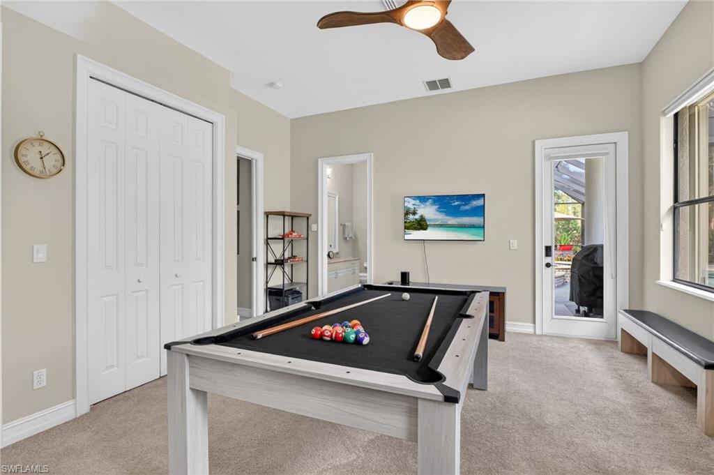 2360 19th Street Southwest Naples, FL 34117 - Photo 33 of 43 a room with pool table and windows