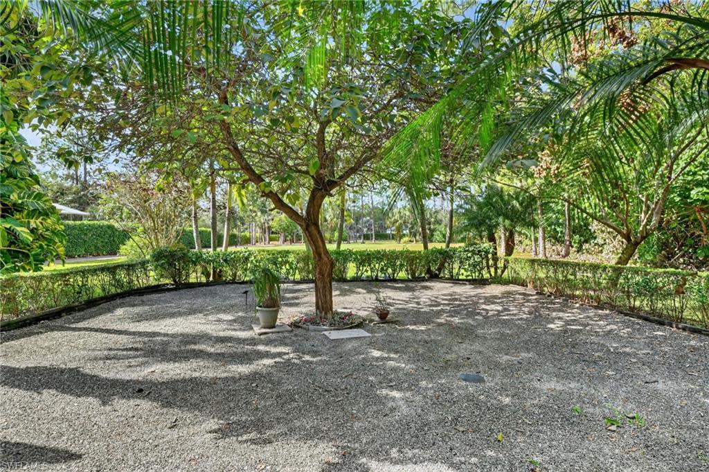2360 19th Street Southwest Naples, FL 34117 - Photo 39 of 43 a view of outdoor space with trees