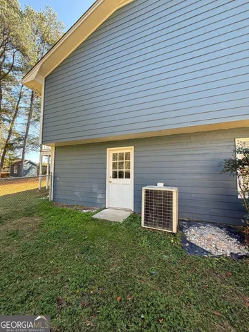 a brick house with a yard