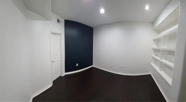 a view of hallway with kitchen