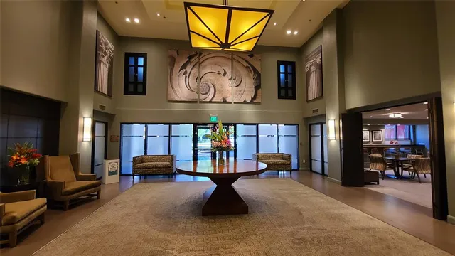 a view of swimming pool with outdoor space and seating area