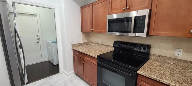 a bathroom with a sink and a shower