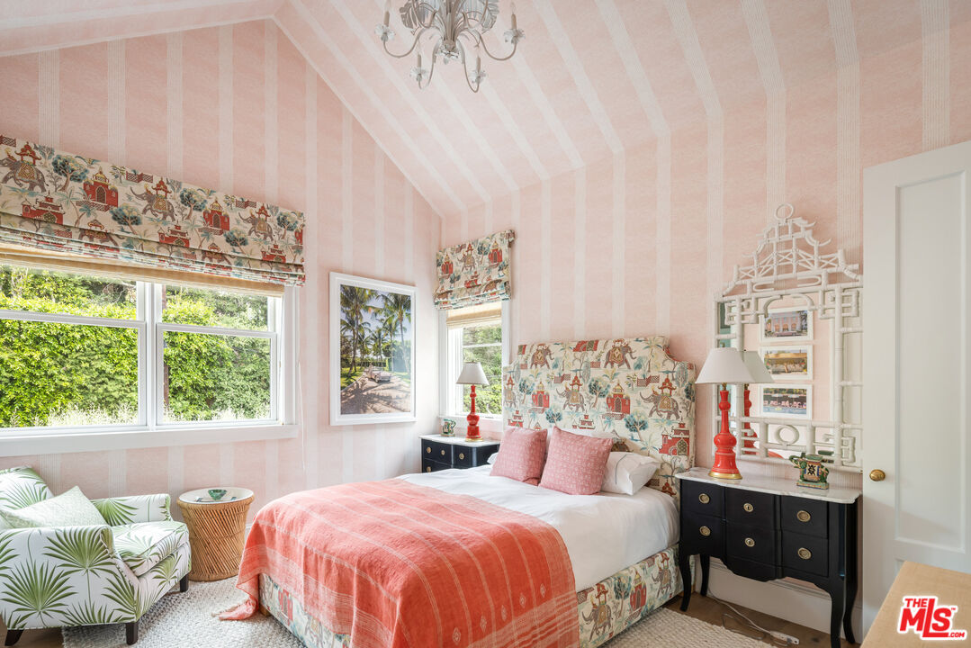 782 Ranch Lane Pacific Palisades, CA 90272 - Photo 31 of 53 a bedroom with a large bed and a window