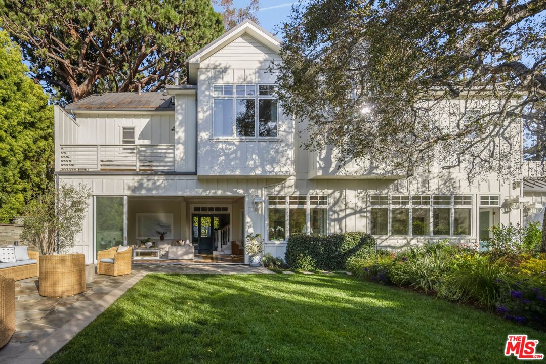 782 Ranch Lane Pacific Palisades, CA 90272 - Photo 36 of 53 a view of house with a yard and a garden