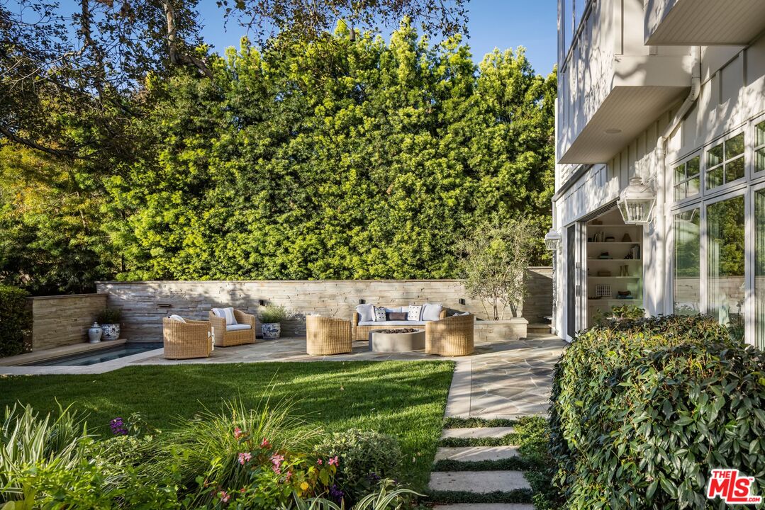 782 Ranch Lane Pacific Palisades, CA 90272 - Photo 39 of 53 a view of garden with a bench in patio