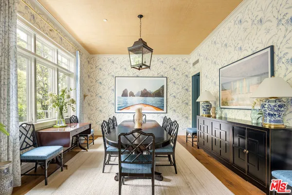 a view of a dining room with furniture window and outside view