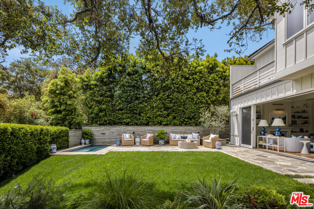 782 Ranch Lane Pacific Palisades, CA 90272 - Photo 42 of 53 a view of yard with swimming pool and seating space