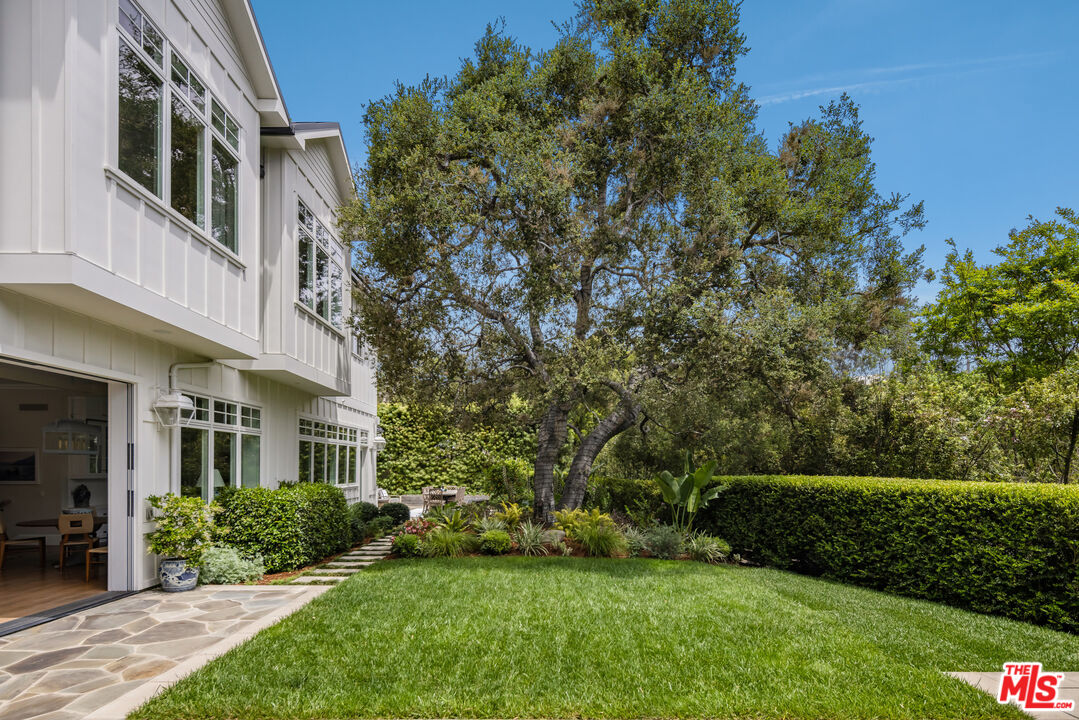 782 Ranch Lane Pacific Palisades, CA 90272 - Photo 43 of 53 a view of a building with a yard