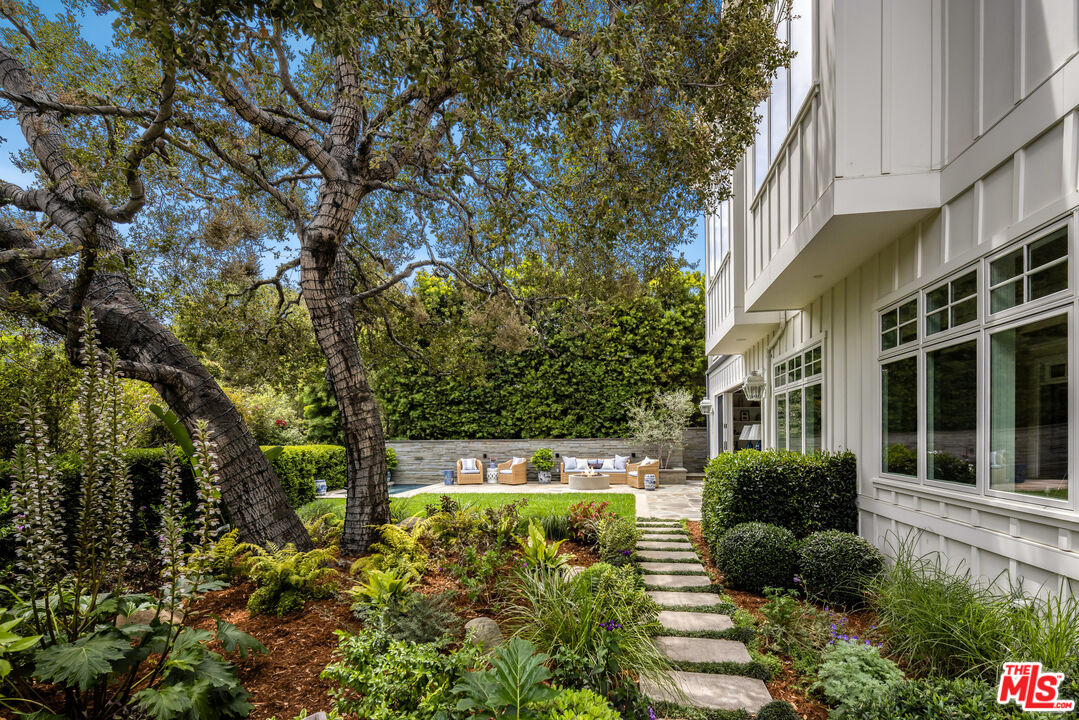 782 Ranch Lane Pacific Palisades, CA 90272 - Photo 47 of 53 a view of a yard with plants and large trees