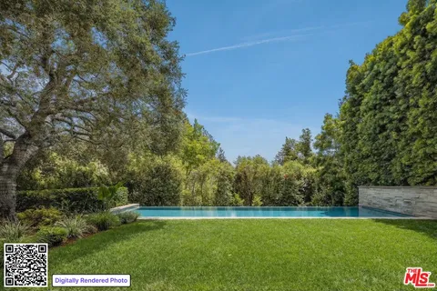 a view of a field with an trees