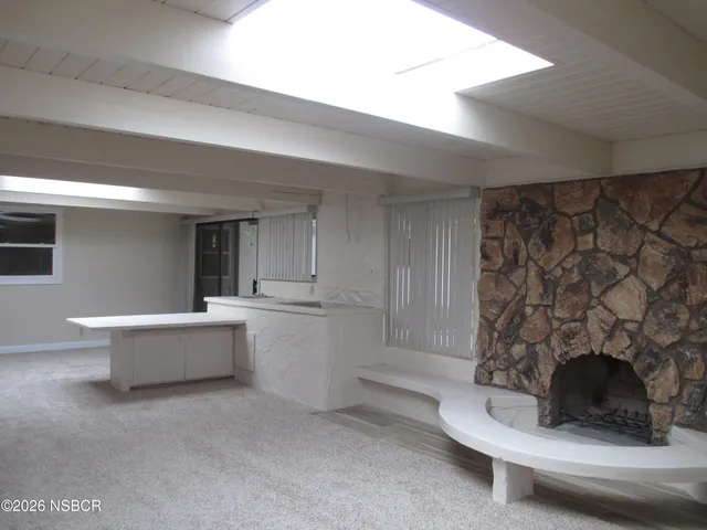 a view of a porch and garden