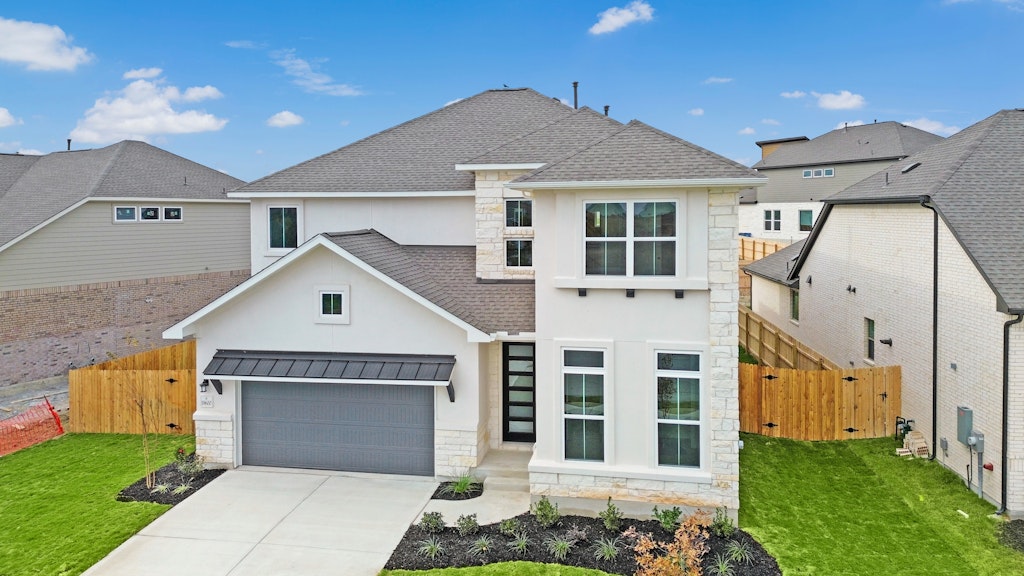 19600 Judys View Pflugerville, TX 78660 - Photo 3 of 34 front view of a house with a yard