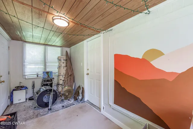 a view of a backyard of the house