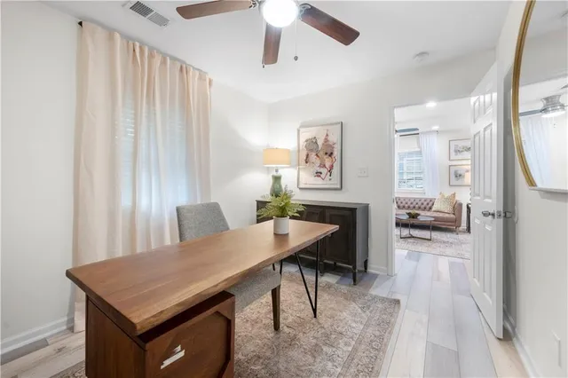 a view of a livingroom with furniture and window