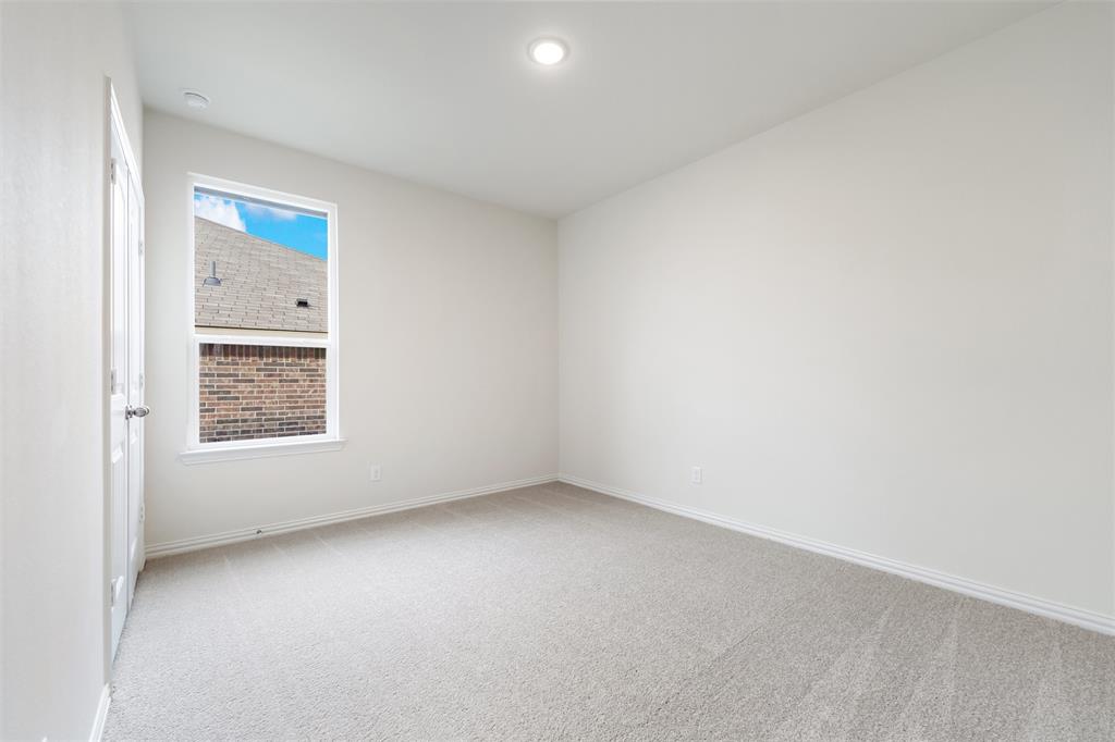 3508 Columbus Street Gainesville, TX 76240 - Photo 16 of 38 an empty room with a window