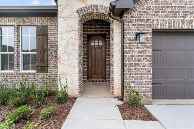a front view of a house with a door