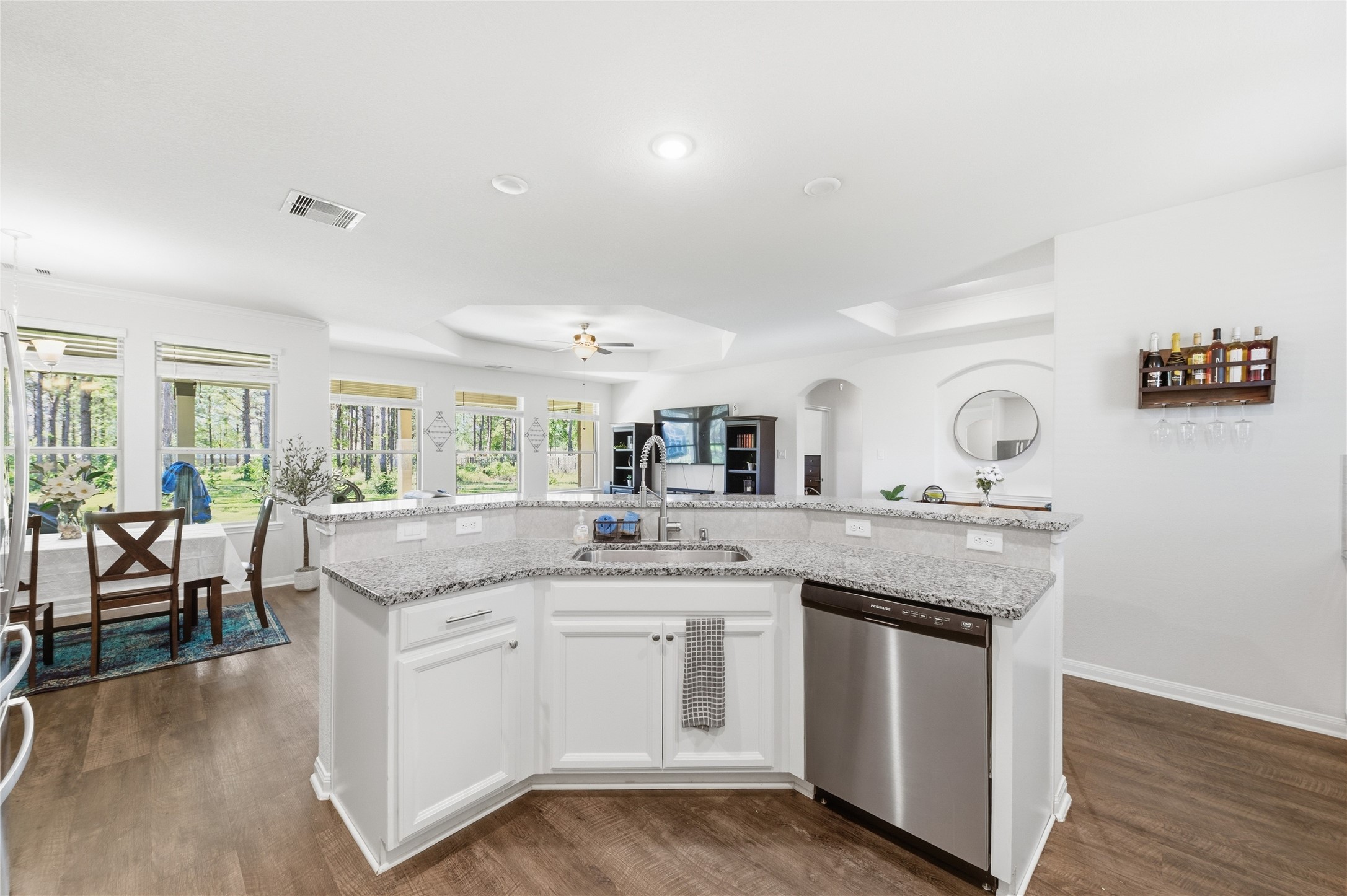 16536 Aransas Conroe, TX 77303 - Photo 11 of 40 a kitchen with a sink stove and cabinets