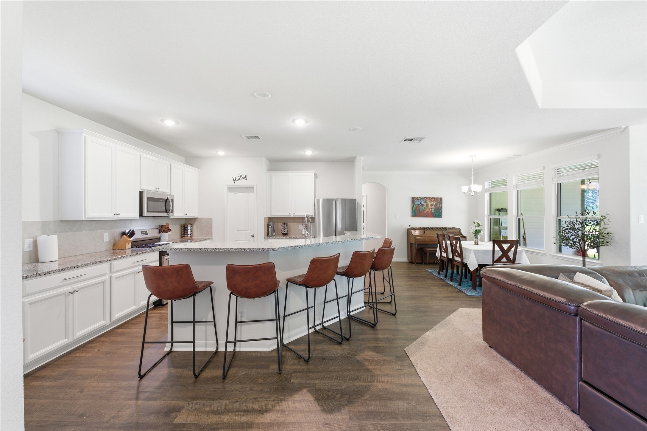 16536 Aransas Conroe, TX 77303 - Photo 14 of 40 a large kitchen with a table and chairs