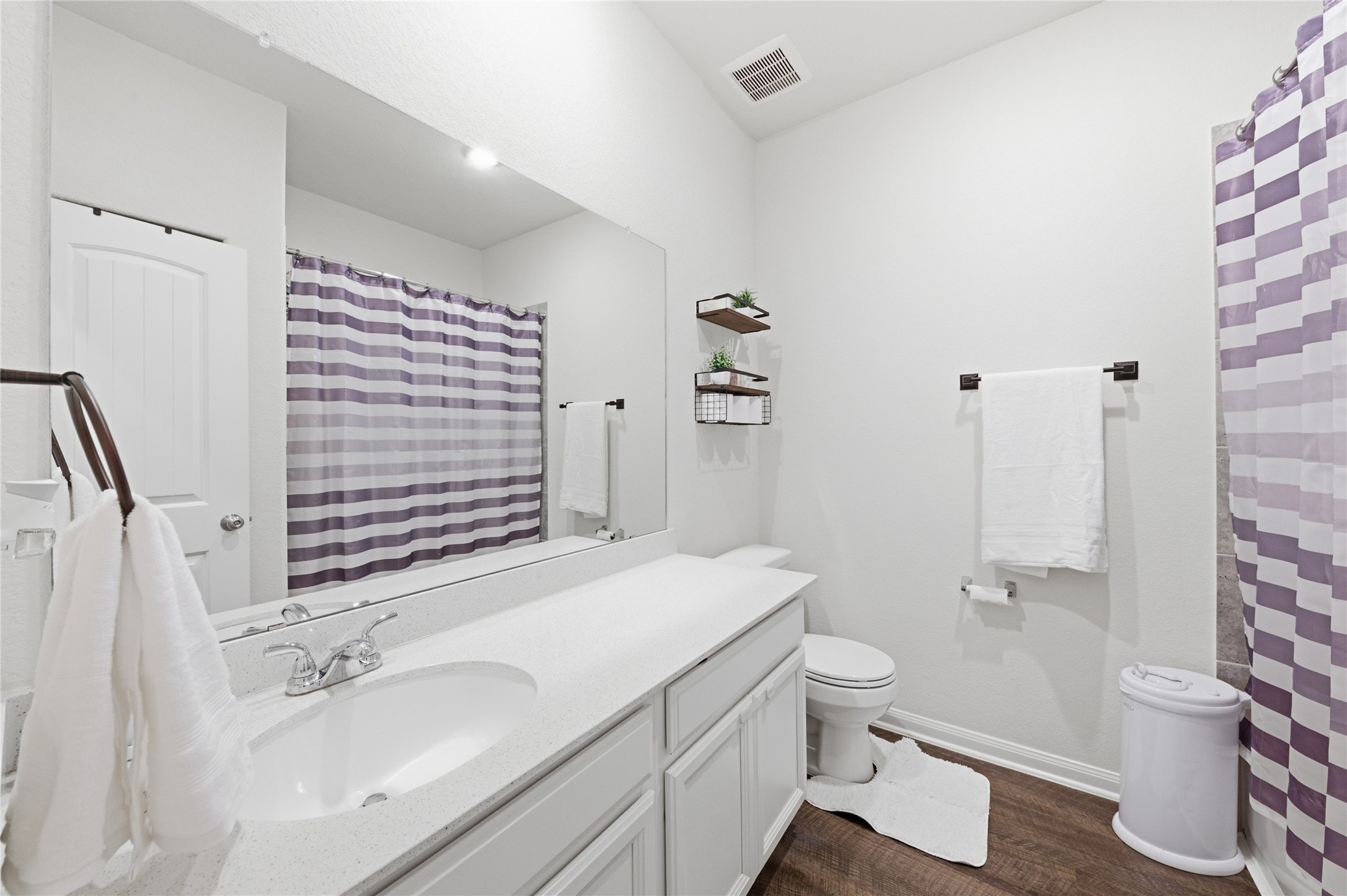 16536 Aransas Conroe, TX 77303 - Photo 16 of 40 a bathroom with a sink toilet and shower
