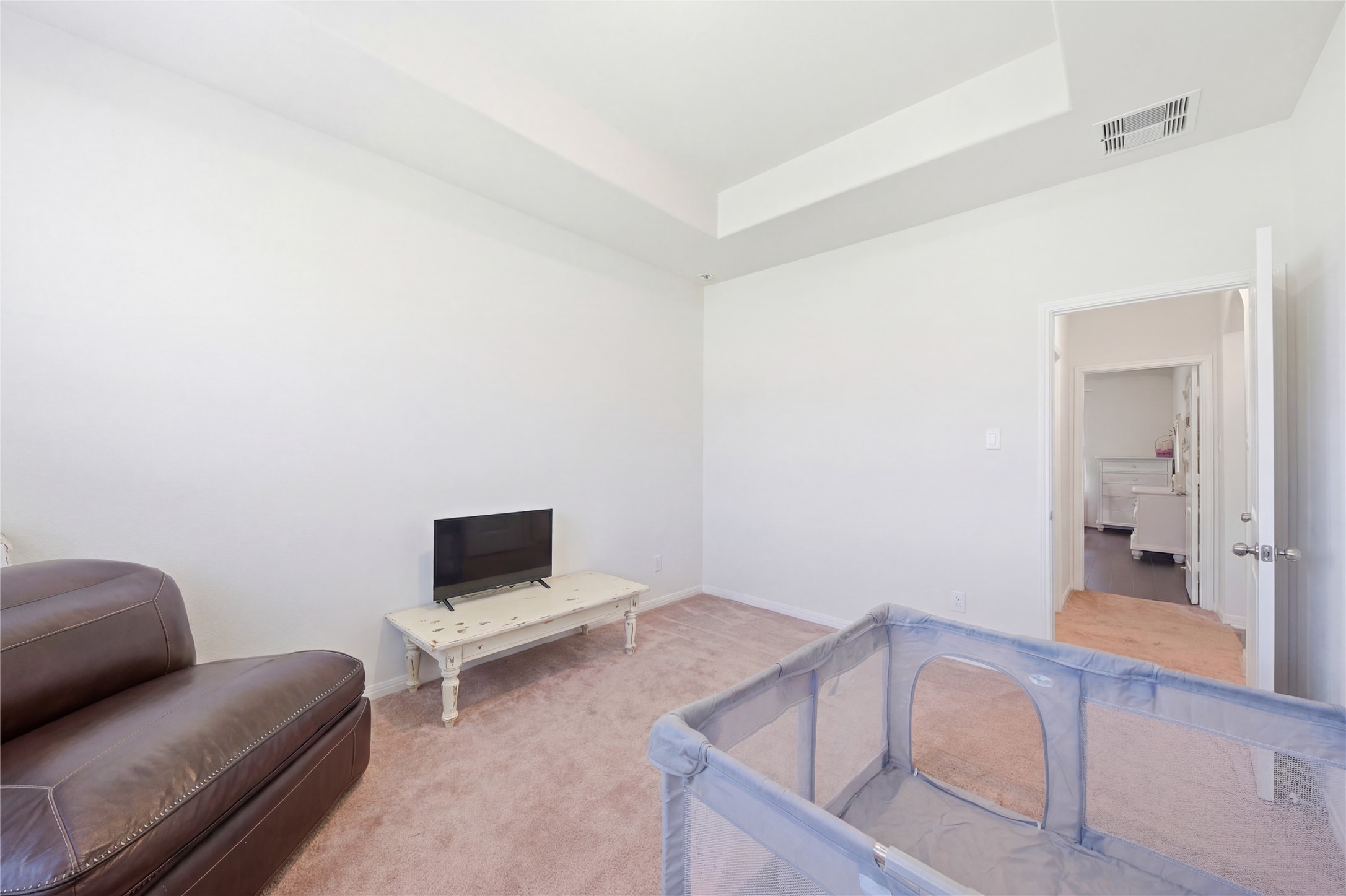 16536 Aransas Conroe, TX 77303 - Photo 18 of 40 a living room with furniture and a flat screen tv