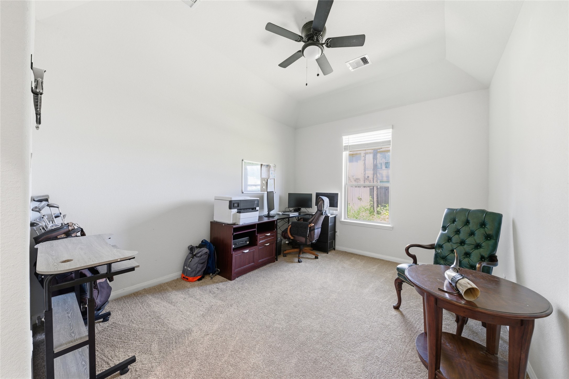 16536 Aransas Conroe, TX 77303 - Photo 25 of 40 a room with furniture and a window