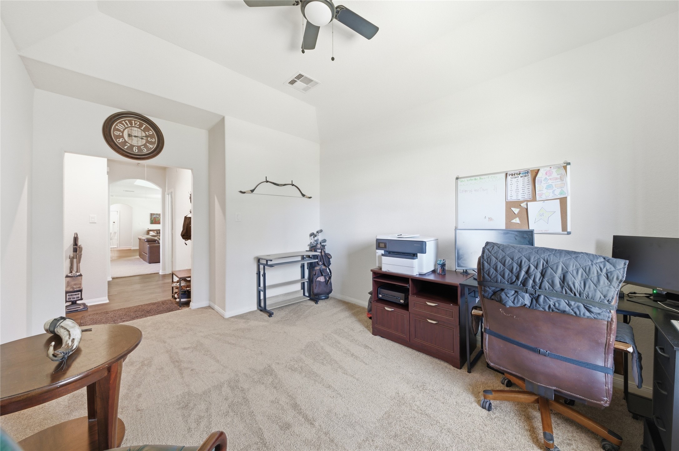 16536 Aransas Conroe, TX 77303 - Photo 26 of 40 a bedroom with a bed and a chair