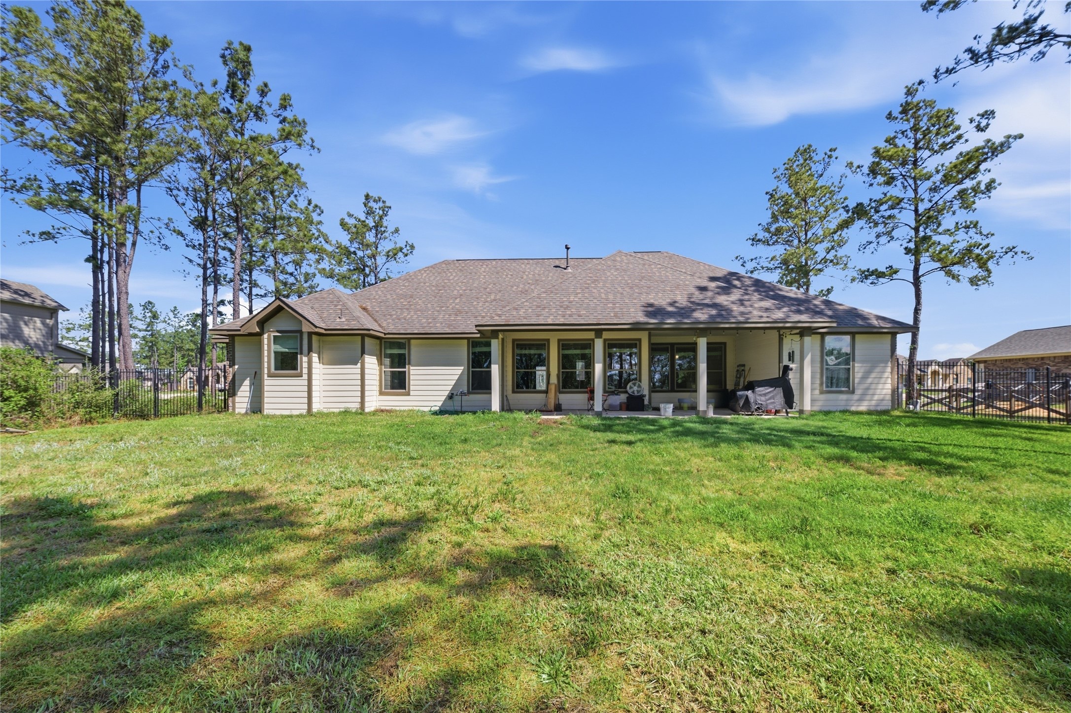 16536 Aransas Conroe, TX 77303 - Photo 32 of 40 a front view of a house with a garden