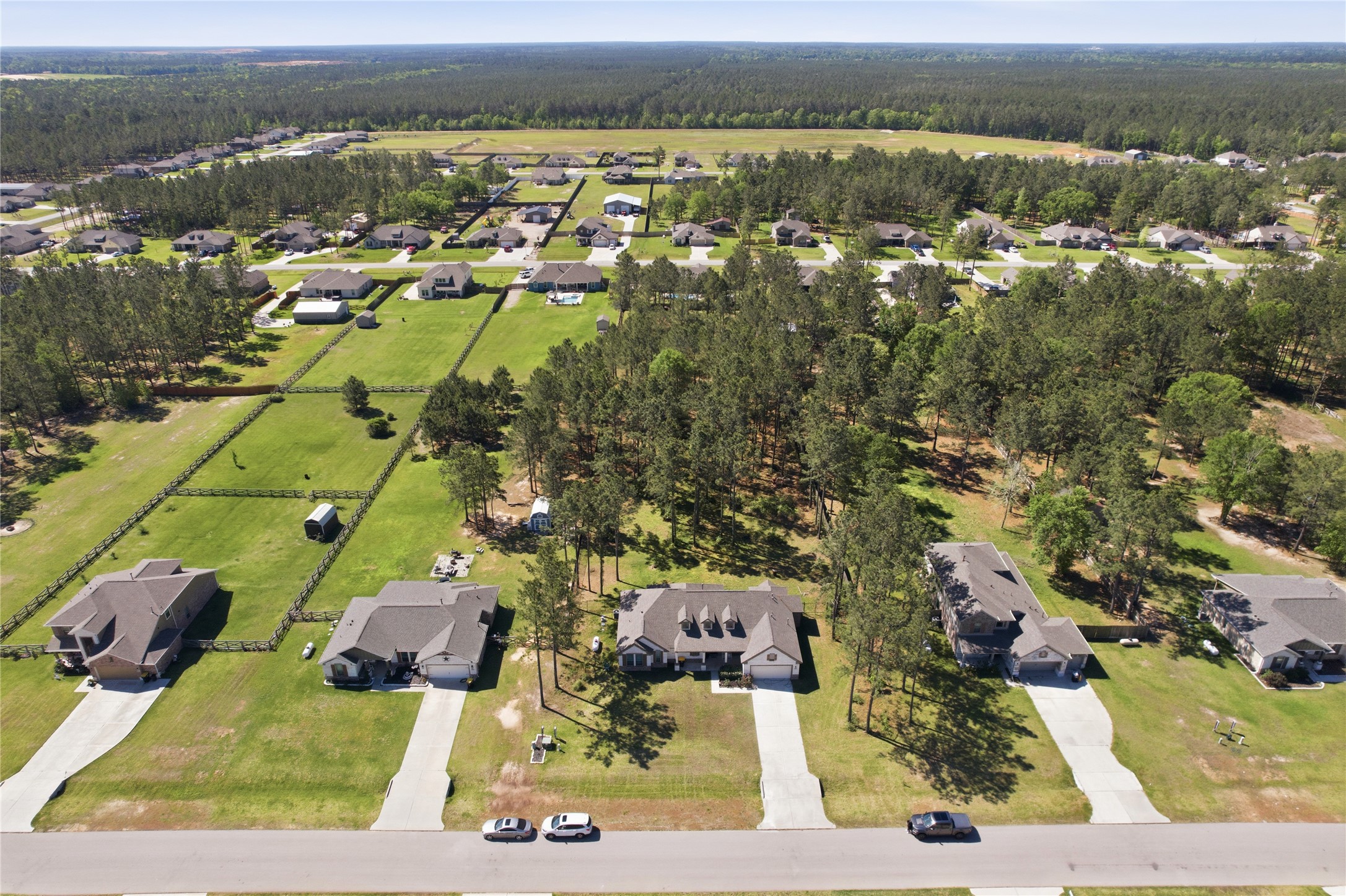 16536 Aransas Conroe, TX 77303 - Photo 34 of 40 an aerial view of residential houses with outdoor space