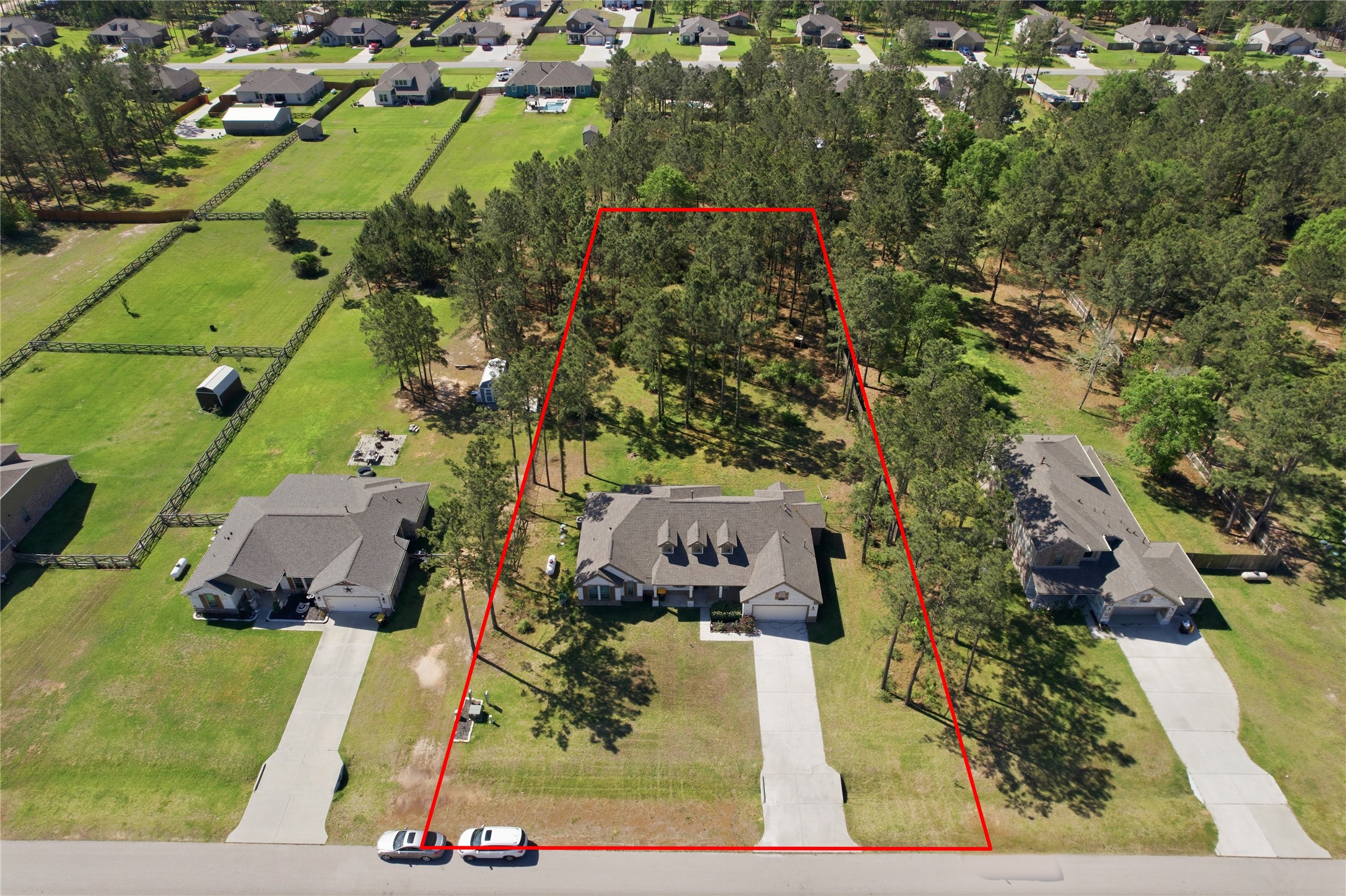 16536 Aransas Conroe, TX 77303 - Photo 35 of 40 an aerial view of residential houses with outdoor space