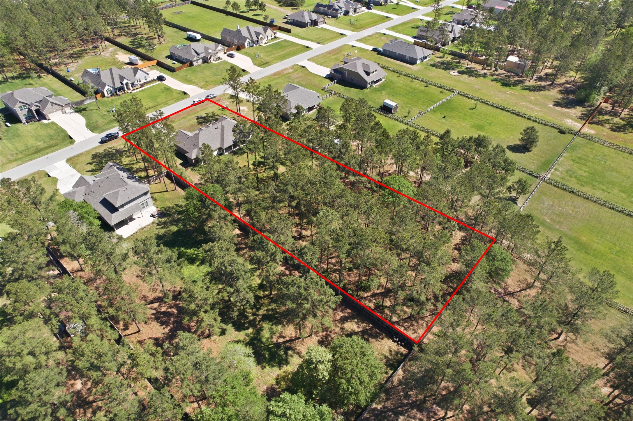 16536 Aransas Conroe, TX 77303 - Photo 36 of 40 an aerial view of residential houses with outdoor space