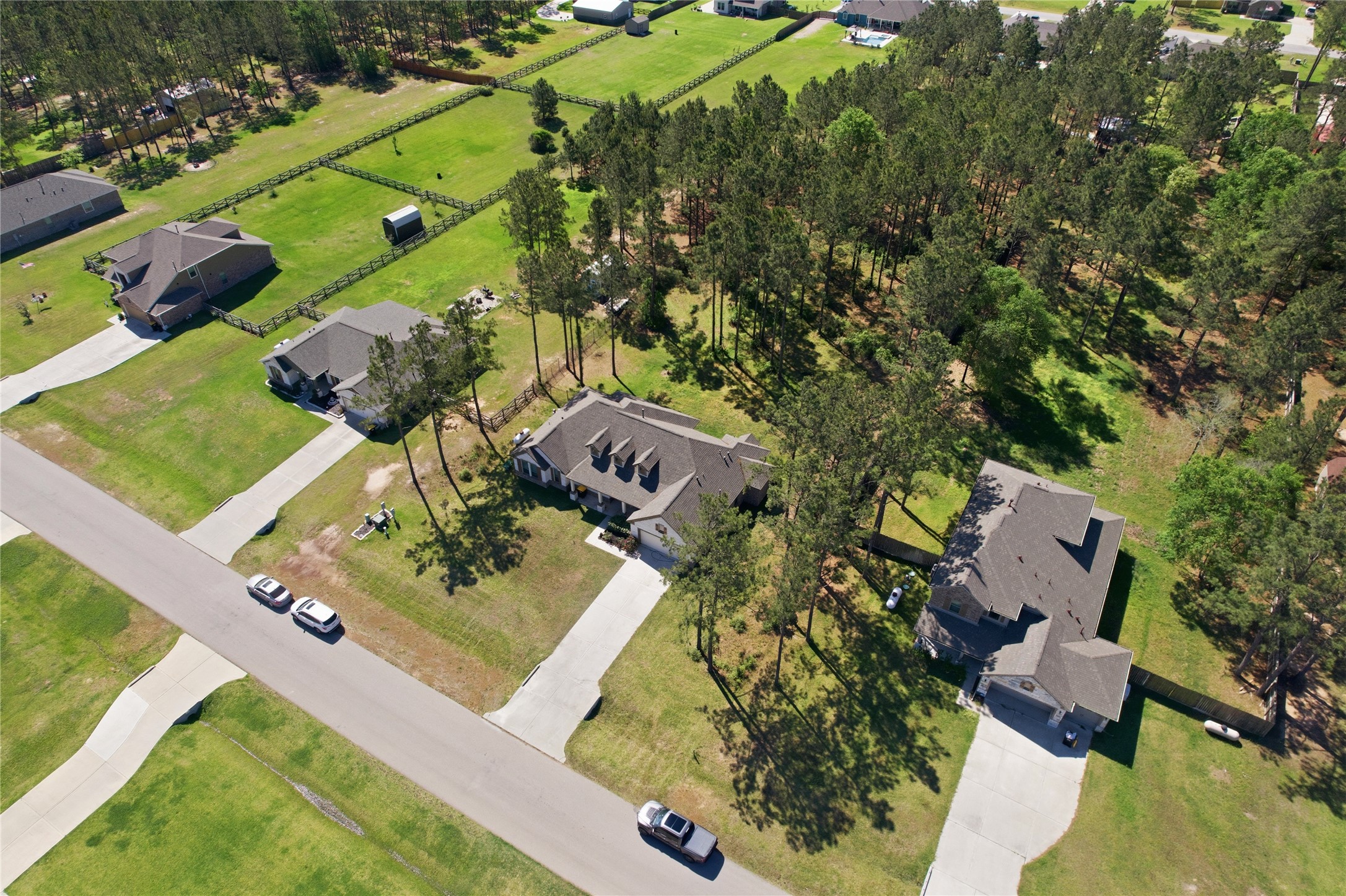 16536 Aransas Conroe, TX 77303 - Photo 39 of 40 an aerial view of residential houses with outdoor space