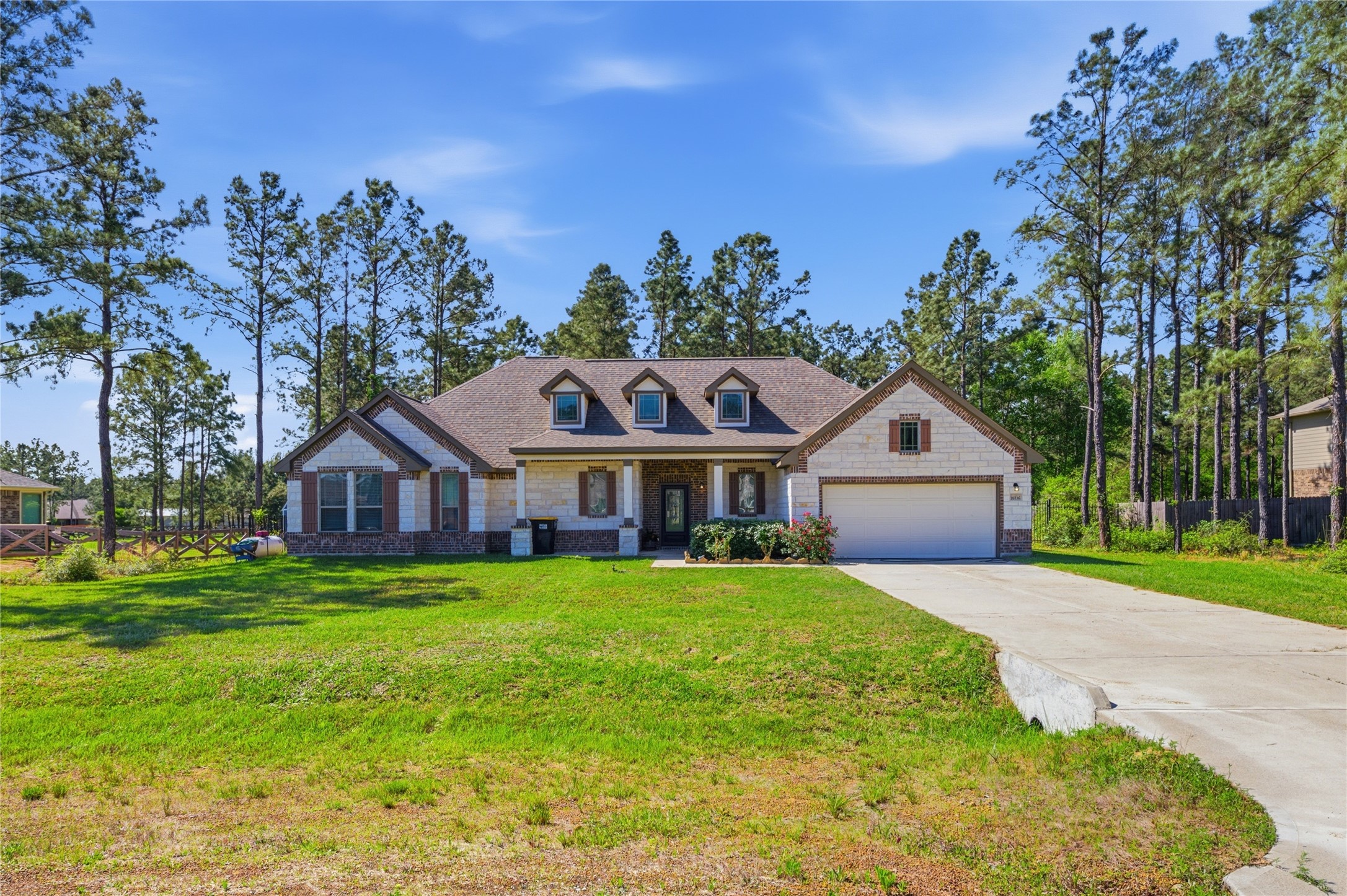 16536 Aransas Conroe, TX 77303 - Photo 4 of 40 a view of a house with a yard