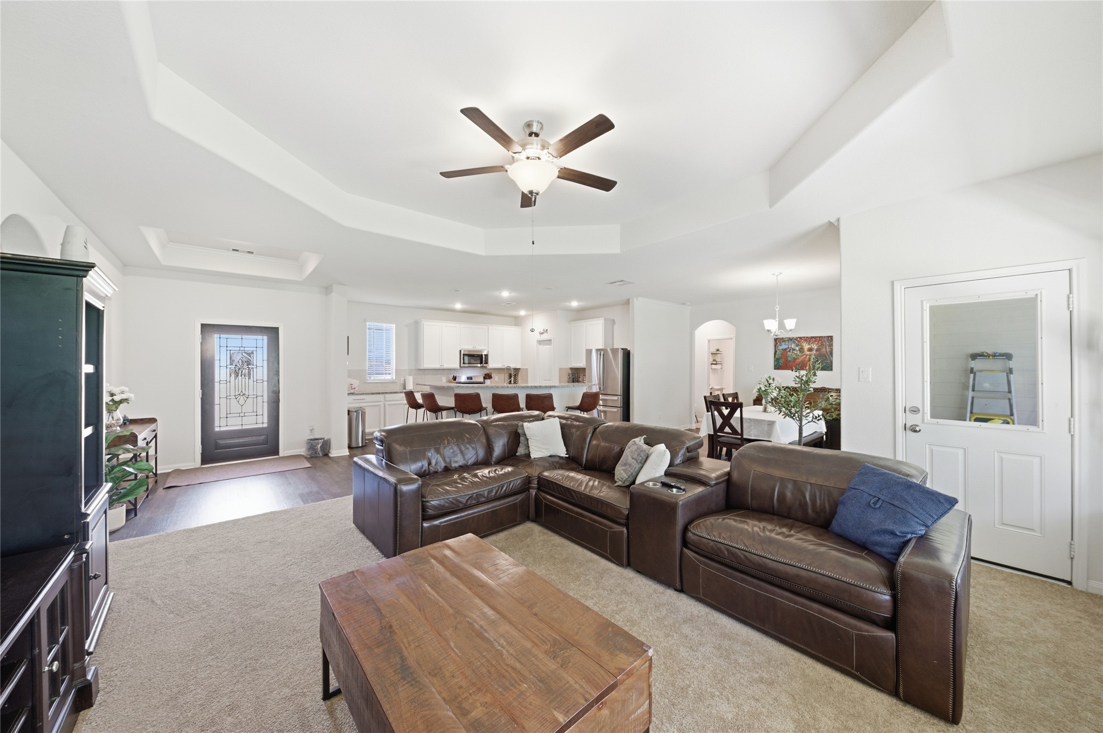 16536 Aransas Conroe, TX 77303 - Photo 40 of 40 a living room with furniture and a chandelier