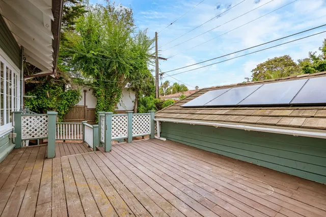 a view of a wooden roof deck