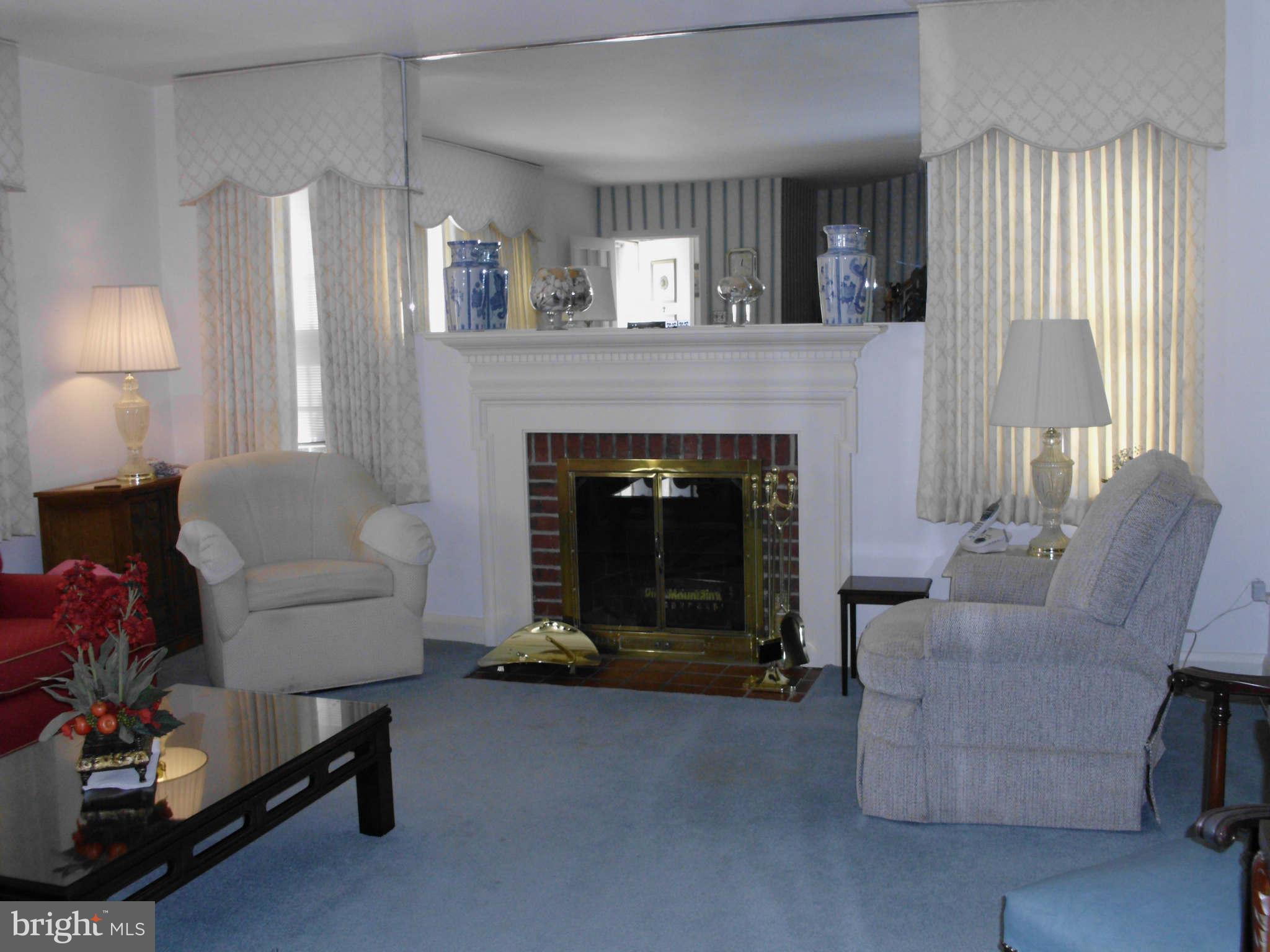 1873 Edgewood Road Baltimore, MD 21286 - Photo 2 of 24 Living Room with wood burning fireplace
