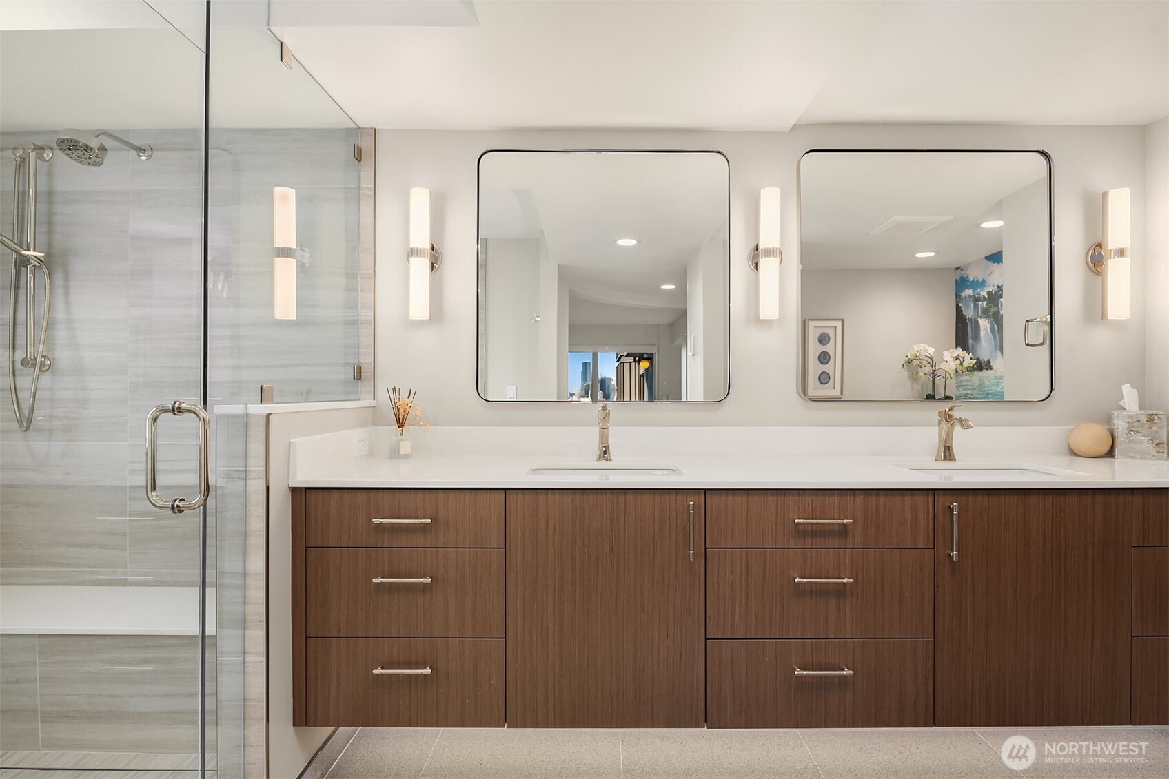 1111 Harbor Avenue Southwest, Unit 200 Seattle, WA 98116 - Photo 19 of 32 a bathroom with a sink double vanity and a mirror