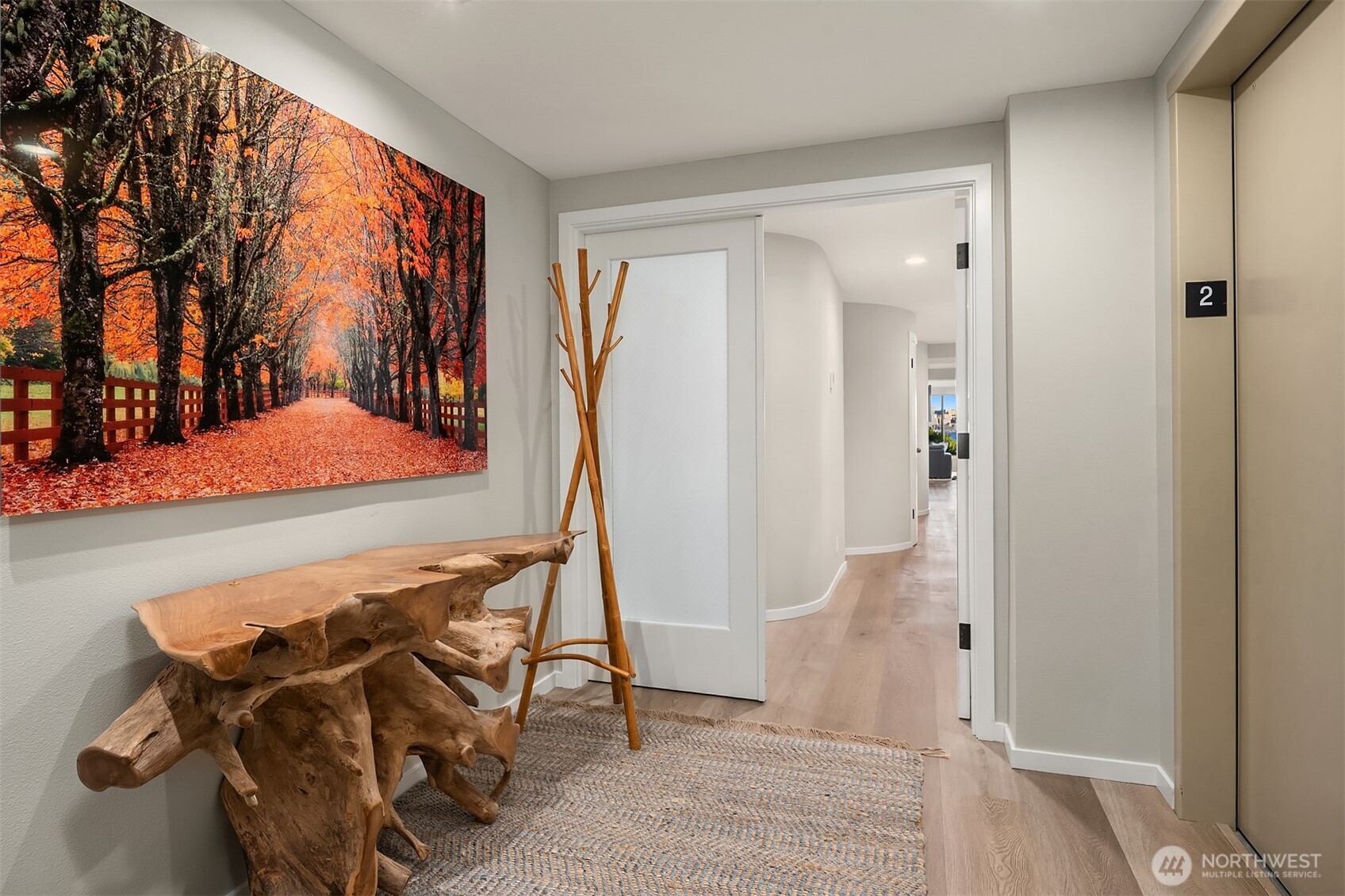 1111 Harbor Avenue Southwest, Unit 200 Seattle, WA 98116 - Photo 29 of 32 a view of walk in closet with clothes and shoes
