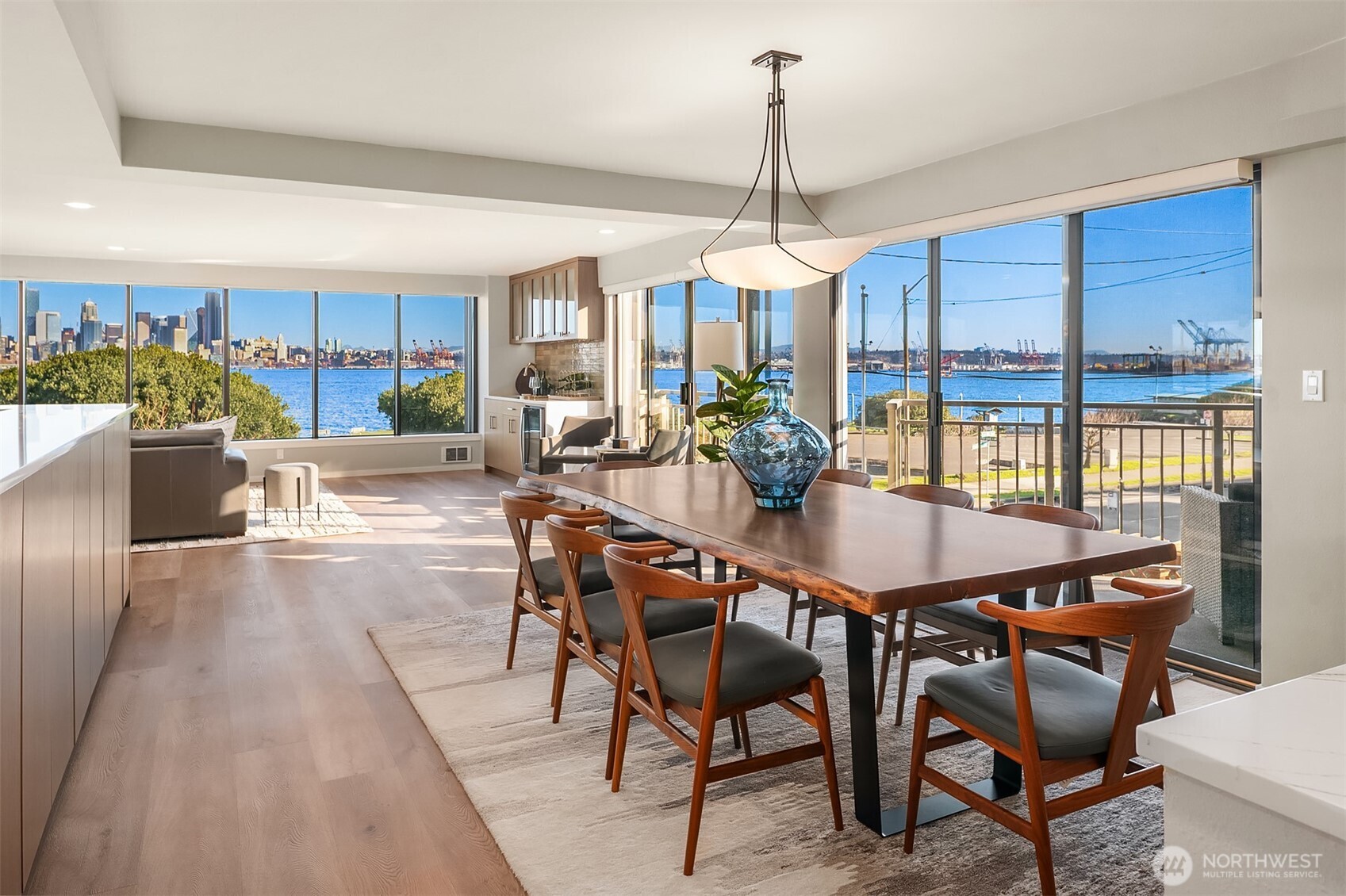 1111 Harbor Avenue Southwest, Unit 200 Seattle, WA 98116 - Photo 3 of 32 a dining room with furniture window and outdoor view