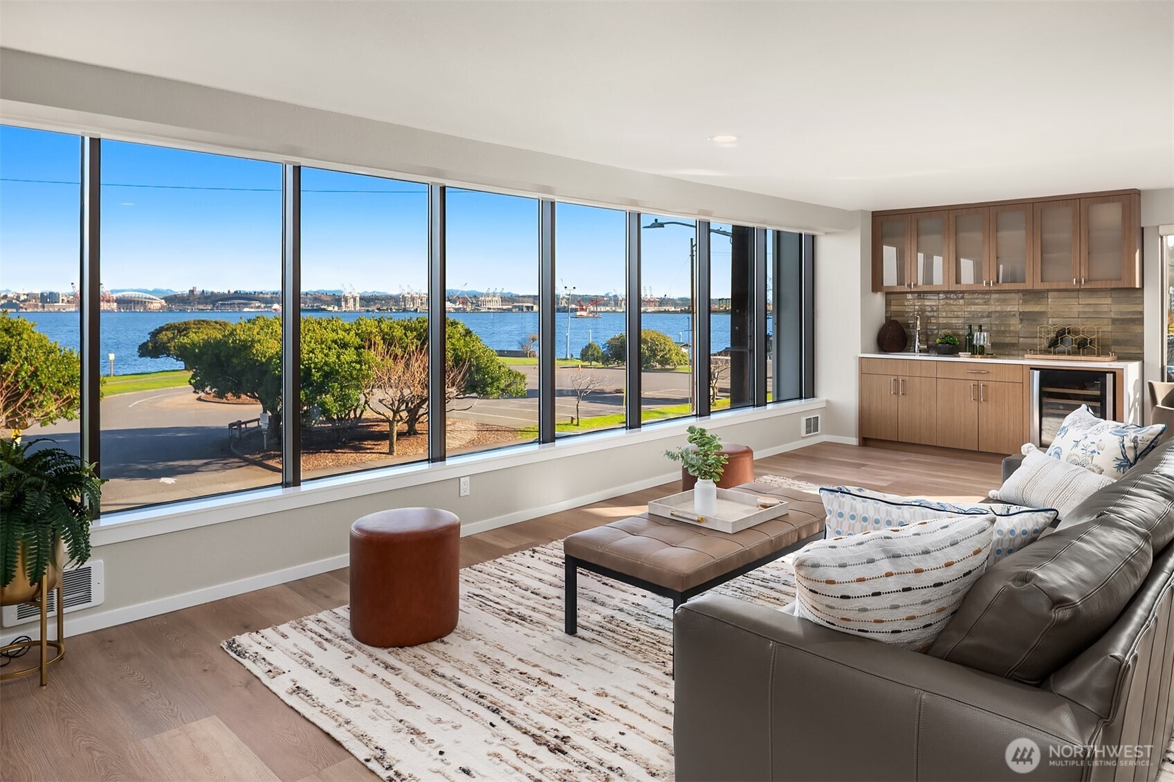 1111 Harbor Avenue Southwest, Unit 200 Seattle, WA 98116 - Photo 9 of 32 a living room with furniture and a large window
