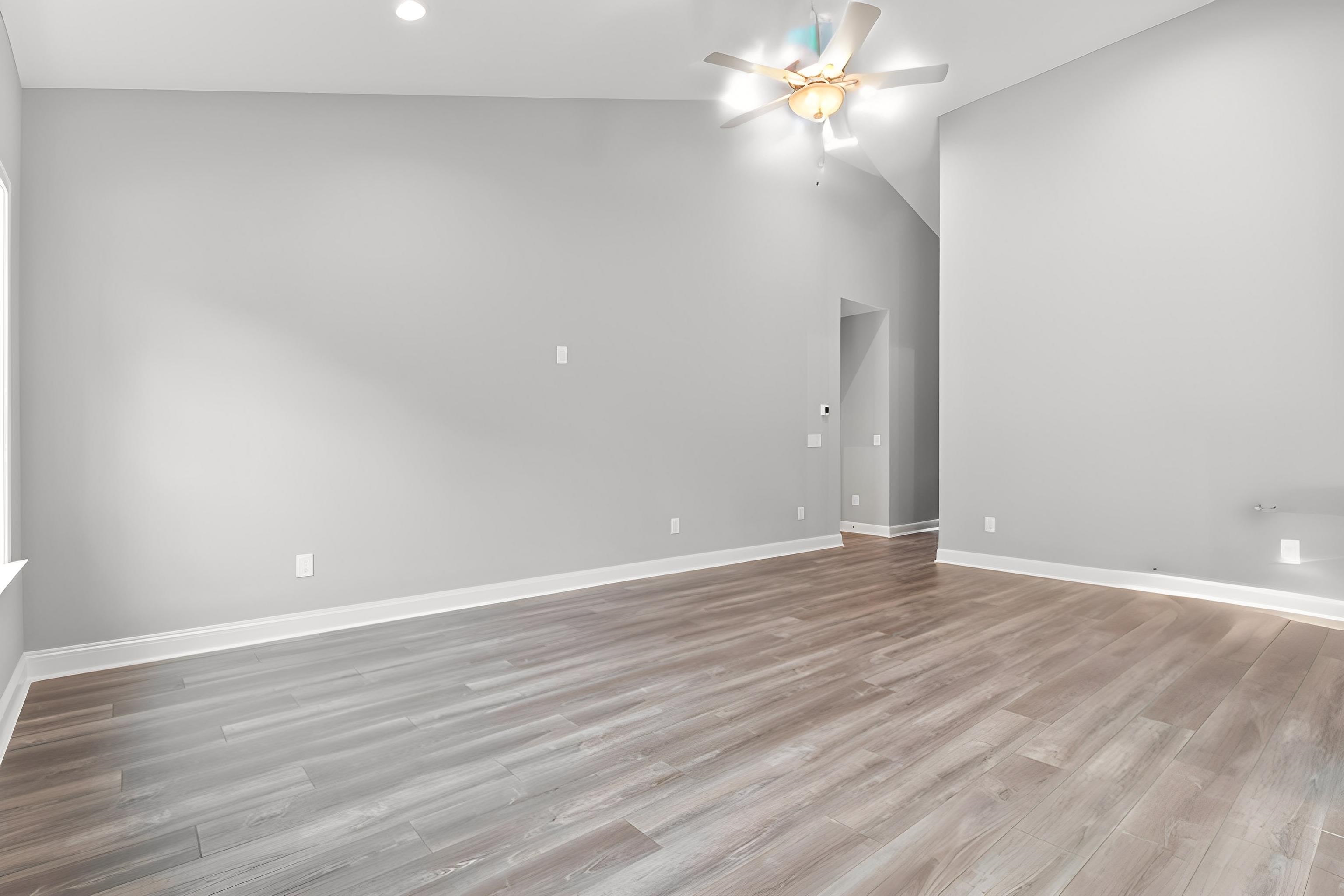 565 Timber Creek Drive Loris, SC 29569 - Photo 18 of 37 Unfurnished room with light wood finished floors, vaulted ceiling, ceiling fan, and recessed lighting