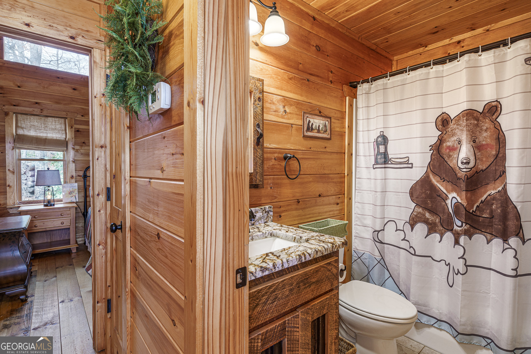 60 Silver Fox Circle Murphy, NC 28906 - Photo 15 of 48 a bathroom with a toilet sink and shower
